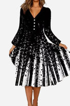Loose waist long sleeve black and white V-neck dress with soft polyester fabric and chic design