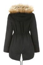 black large hooded velvet coat with fur trim on hood designed for warmth and style