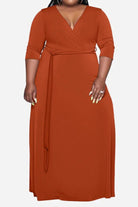 Elegant plus size dress with belt, deep V-neck, 3/4 sleeves, swing skirt in solid rust color