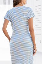 Back view of woman wearing Airy Stripe Sheath Cotton Dress with blue and white stripes and short sleeves