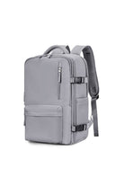 Chic Wanderlust Waterproof Backpack in grey with multiple compartments, ergonomic padded straps, and durable waterproof fabric for versatile travel and daily use.
