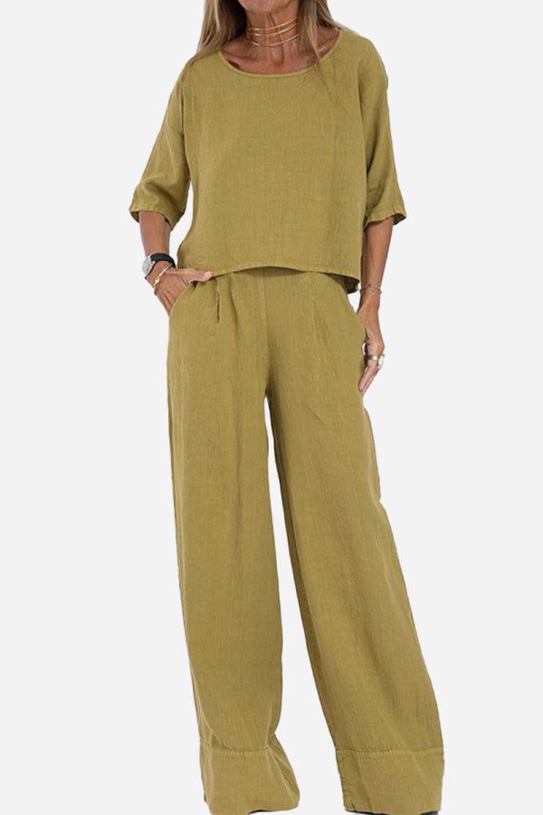 Olive green short-sleeved pullover and wide trouser matching set in breathable cotton with deep pockets and loose fit