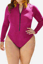 Women's zip front long sleeve one-piece swimsuit in rose red with high-leg cut and slightly elevated collar