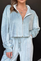 Light blue zip up cropped sweatshirt and wide leg pants leisure two-piece co-ord in plush velour fabric