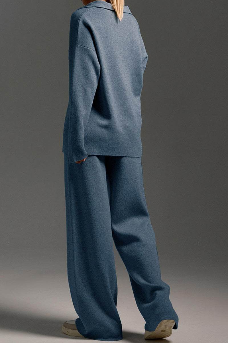 Back view of model wearing plush & preppy camel two-piece set in blue with wide-leg pants and long-sleeve top