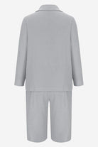 Gray blazer and high-waisted shorts two-piece set back view