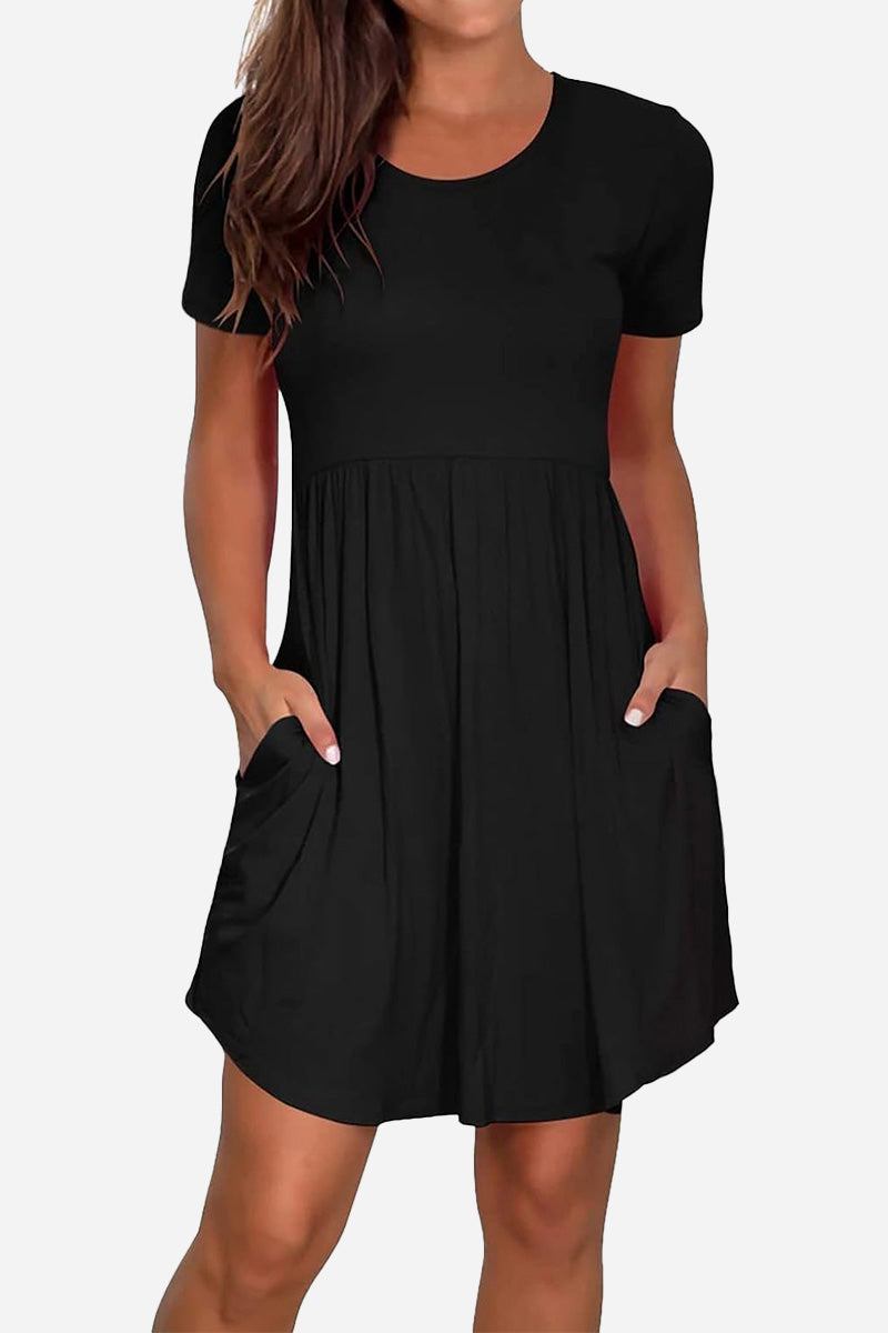 Black short-sleeved pleated dress with pockets and a modest, flattering cut