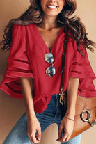 Red mesh panel sleeve loose fit top with flared 3/4 bell sleeves and V neckline