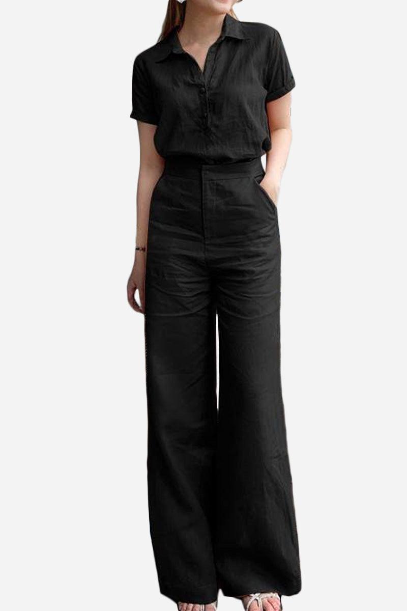 Woman wearing black linen-look set with short sleeves and wide-leg pants