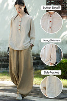 Woman wearing loose beige ramie linen and cotton blouse with button detail, long sleeves, and side pocket in casual outdoor setting