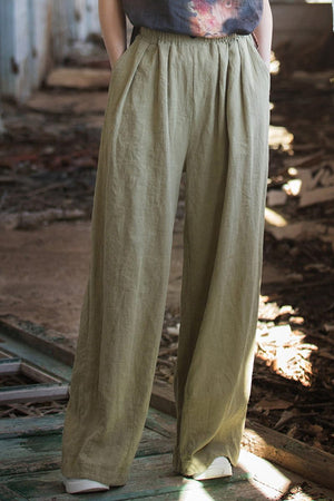 Women's sandwashed ramie linen relaxed fit pants in olive green with elastic waistband