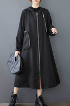 Black ZipLine Oversized Long Coat with zippered pockets and A-line silhouette, lightweight and travel-friendly.