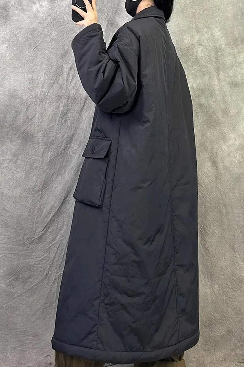 Plus size oversized black windbreaker parka with long sleeves and large side pocket worn by model