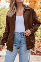 Brown oversized faux leather motorcycle jacket styled with casual outfit