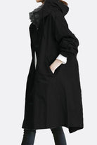 Black Travel-Smart Waterproof Hooded Windbreaker with adjustable hood and breathable fabric