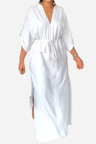 White All-Day Drape Dress with adjustable waist tie and front slit, breathable polyester fabric.