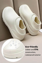 White fleece-lined comfort clogs with waterproof eco-friendly rubber and EVA sole