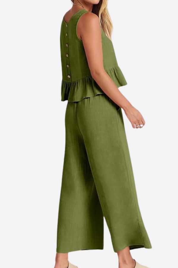 Green linen-like feel set with sleeveless top and wide-leg pants, lightweight and breathable for travel.