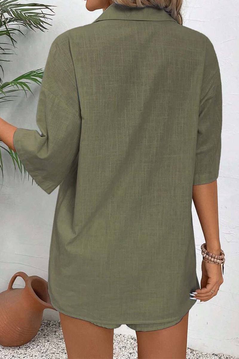 Back view of woman wearing olive green Coastal Linen Cotton two-piece set top with short sleeves and textured fabric.