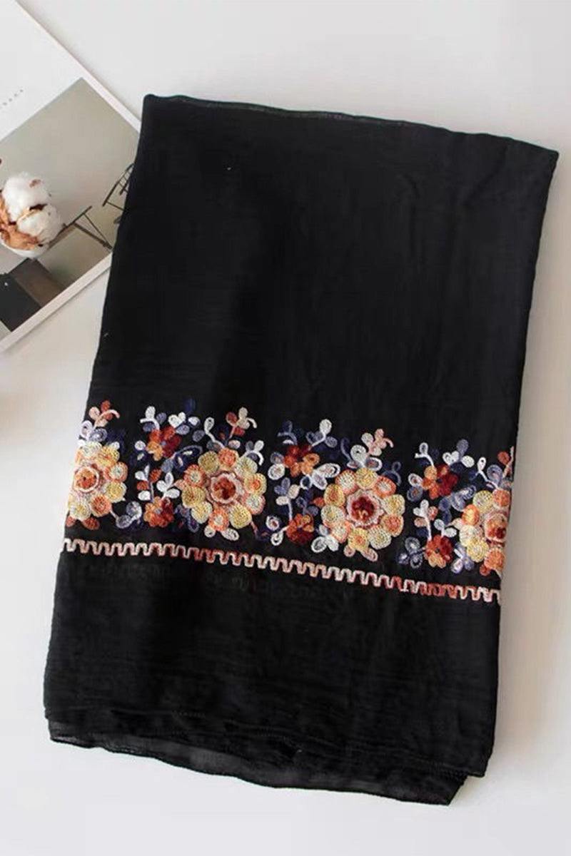 Black embroidered travel-must shawl with colorful floral patterns, lightweight and versatile wrap for travel and sun protection