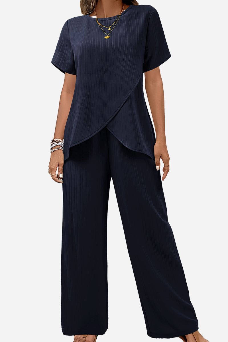 Women's textured elegance navy blue two-piece set with asymmetrical top and wide-leg pants