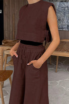 woman wearing breathable cotton-linen blend brown sleeveless top and wide-leg pants set indoors