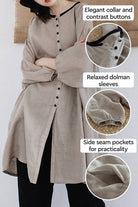 100 linen oversized button-down tunic with elegant collar, contrast buttons, relaxed dolman sleeves, and side seam pockets in neutral grey