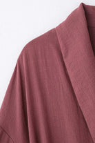 Dusty rose wide-leg pants and matching top from Mix-Match Lounge-to-Travel Set with soft polyester fabric