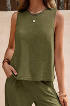 Woman wearing olive green sleeveless wide leg pants set with soft fabric and relaxed fit