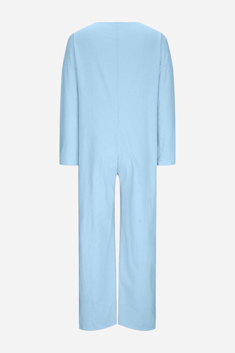Light blue relaxed jumpsuit with long sleeves and wide legs, back view