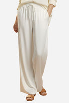 White Subtle Moves Silk Wide Leg Trousers with high waist and relaxed fit for breathable comfort and elegant drape
