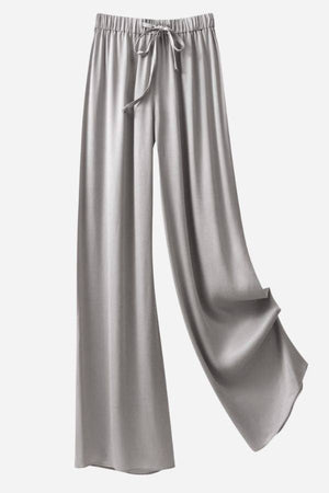 Subtle Moves Silk Wide Leg Trousers in light gray with high waist and drawstring, made of breathable mulberry silk blend.