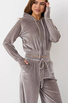 Women's modern cropped velour tracksuit set with high-waist drawstring pants in soft plush fabric