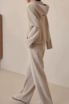 woman wearing beige Quiet Comfort Everyday two-piece ribbed knit hoodie and wide-leg pants set