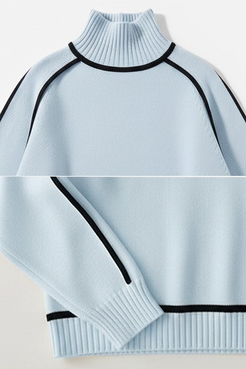Light blue Zero Itch Turtleneck Sweater with black contrast trim, soft knit, and slimming fit.