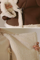 Cropped faux leather sherpa jacket with cream fleece lining and trim, soft and warm mid-weight outerwear.