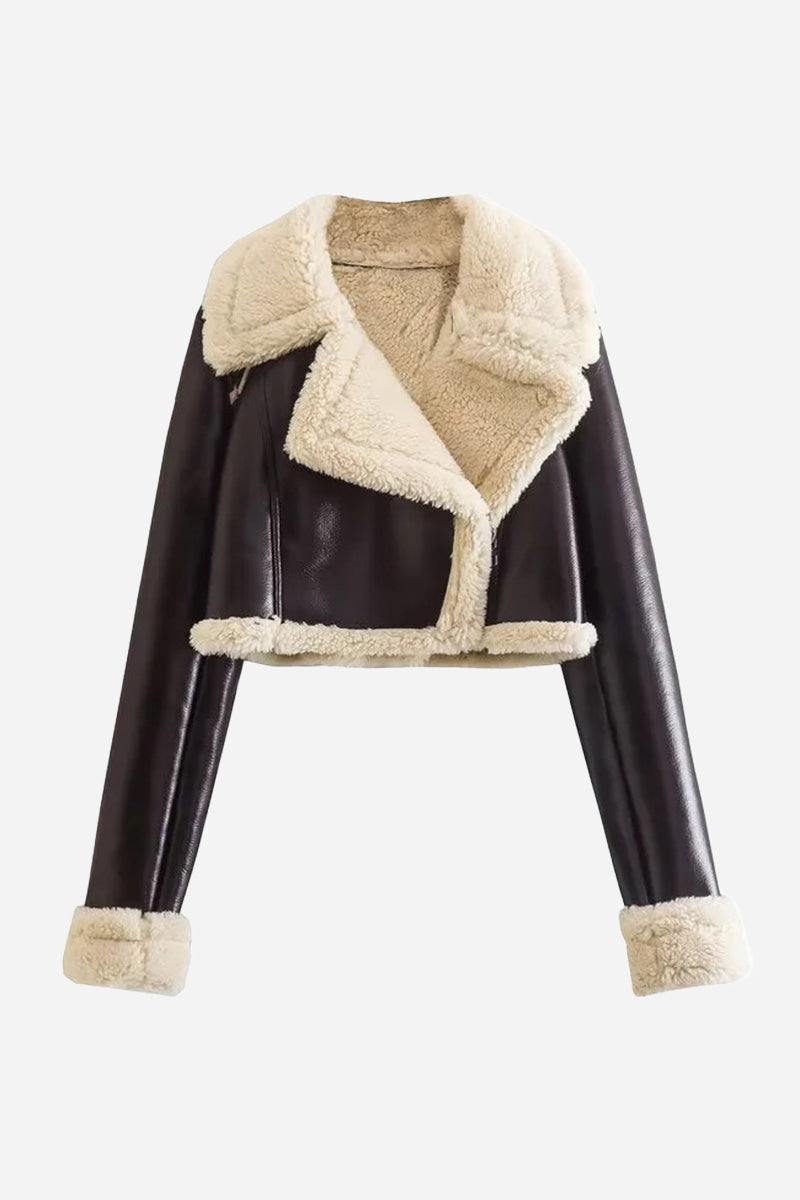 Cropped faux leather sherpa jacket with cream lining and trim, warm and stylish outerwear.