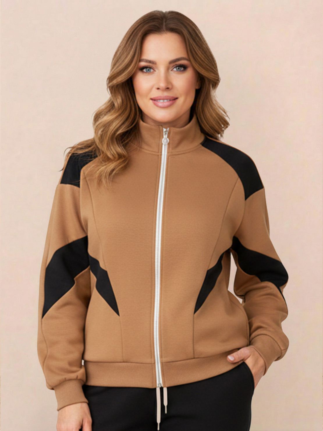 Woman wearing colorblock comfort tracksuit with contrast curved panels