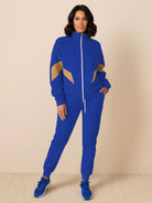 Colorblock Comfort Tracksuit with contrast curved panels and relaxed fit for travel and casual wear
