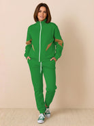 Woman wearing Colorblock Comfort Tracksuit with slimming contrast curved panels and relaxed fit