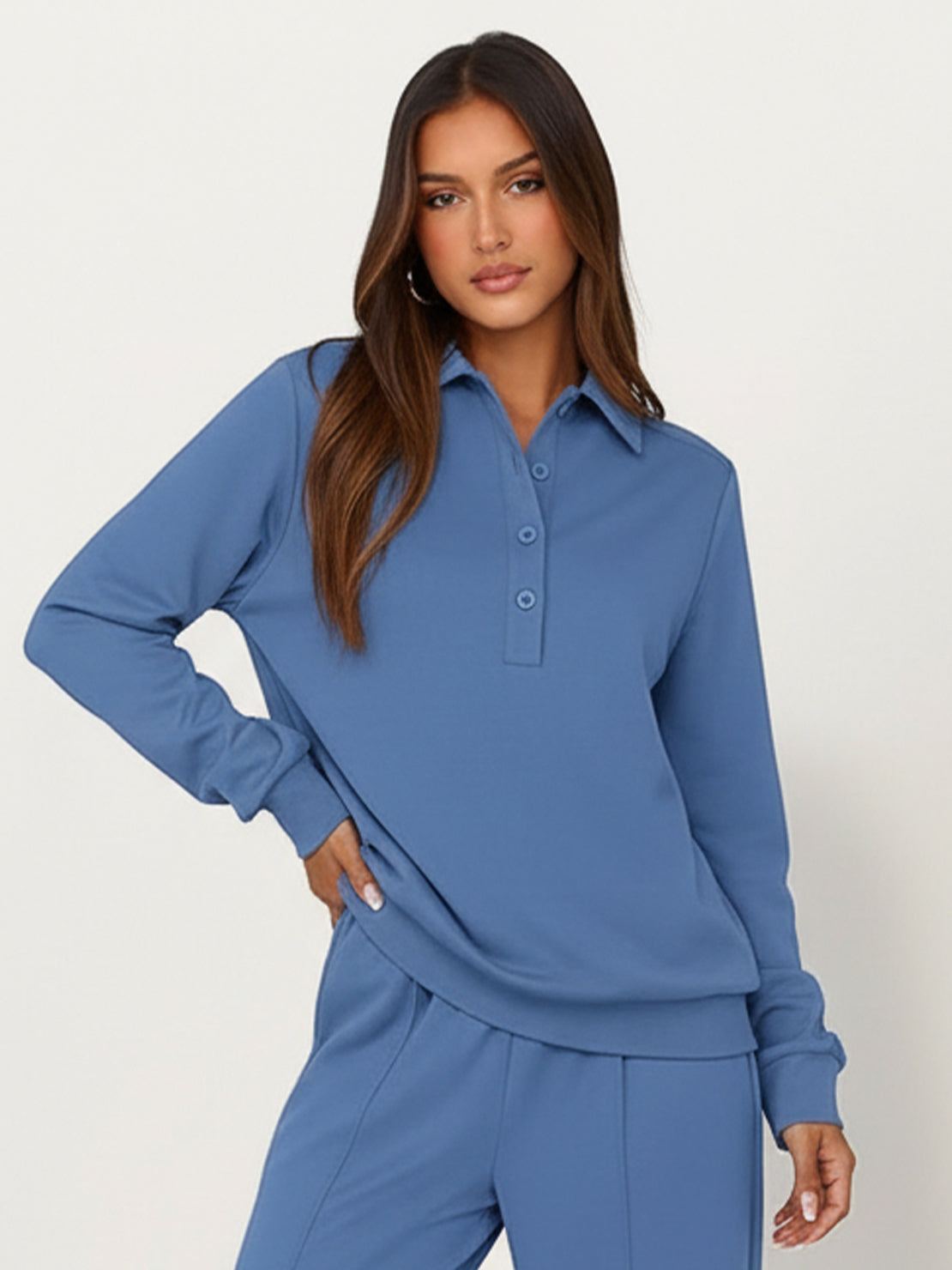 Wrinkle-free polo set with structured quarter-button top and high-waisted pants in breathable fabric