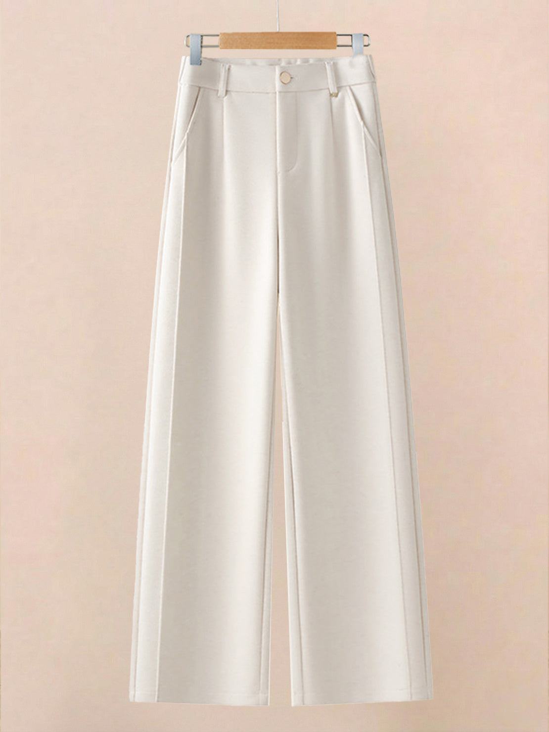 White wide-leg thermal wool blend trousers with elastic back waist and tailored suit-style front