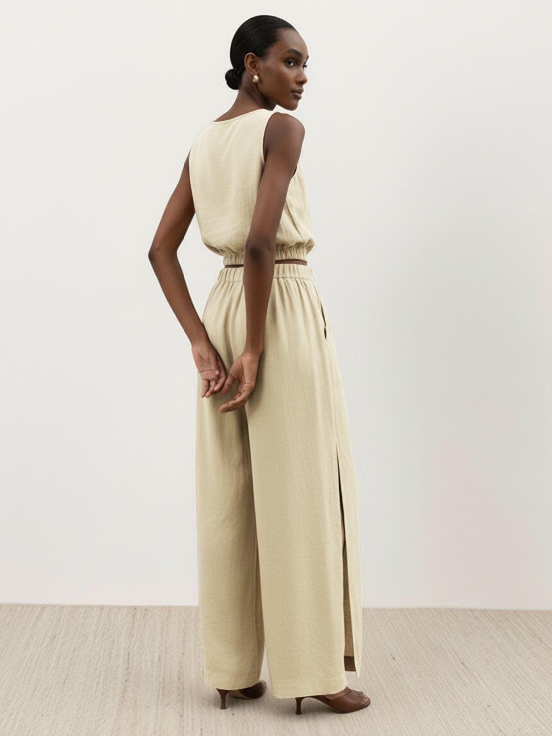 Lightweight linen-blend two-piece set with sleeveless top and wide-leg pants with elastic waistband and side slits for breathability