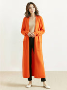 Long Australian Merino Wool cardigan with open front and patch pockets for versatile layering