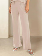 Oversized long-line loungewear set with pullover and straight-leg pants in soft knit fabric