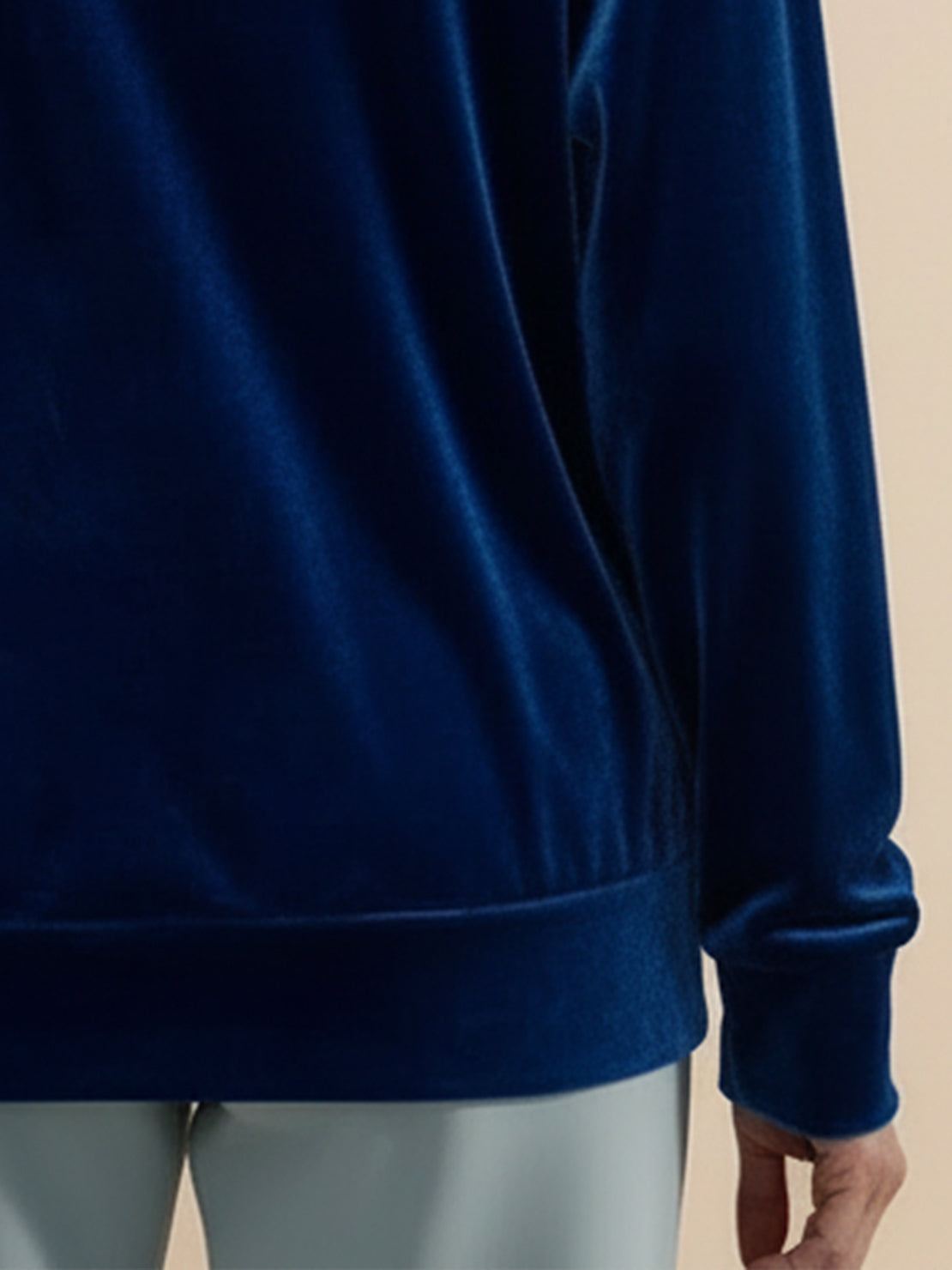 Ultra-soft velvet half-zip hoodie with kangaroo pocket and relaxed fit