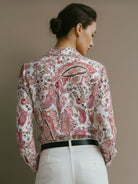 floral button-down shirt with long roll-up sleeves and relaxed hip-length fit