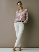 floral button-down shirt with long roll-up sleeves and hip-length relaxed fit