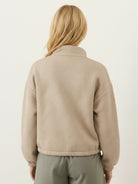 Cropped textured baseball jacket with full zipper, elastic cuffs, and waistband for casual layering