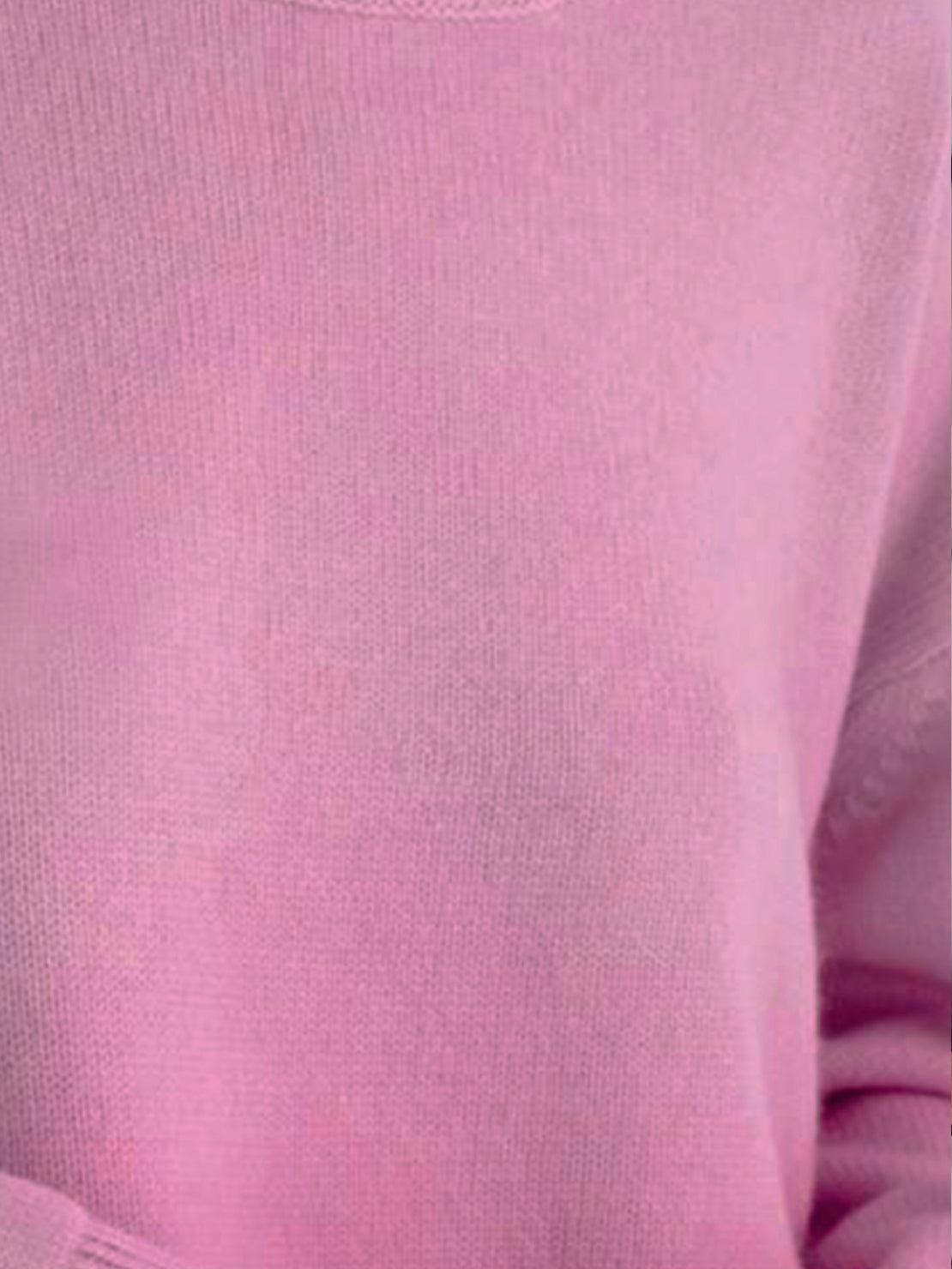 Oversized crew neck knit sweater with dropped shoulders and ribbed cuffs in neutral color